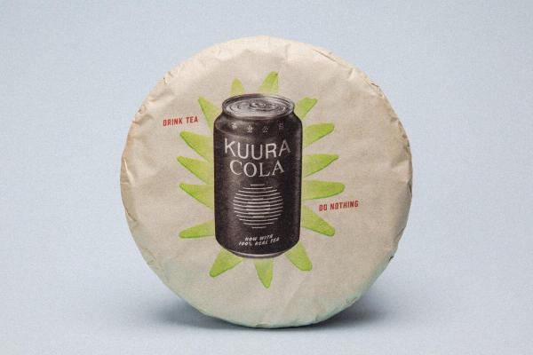 An image of a Kuura Cola cake in its packaging.