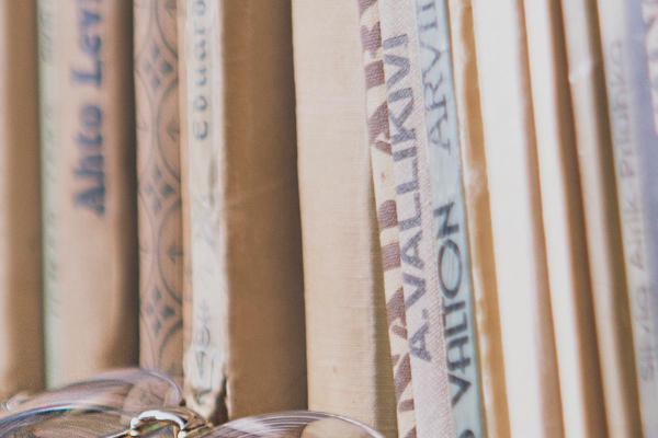 A photograph of a shelf of books.